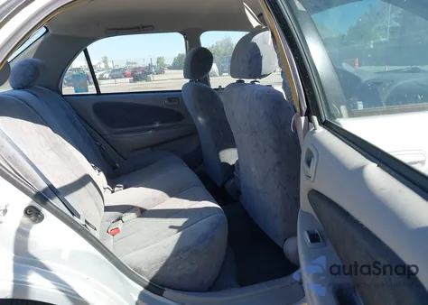 2000 Toyota Corolla Le из США, поврежденный, VIN 1NXBR12E4YZ325974